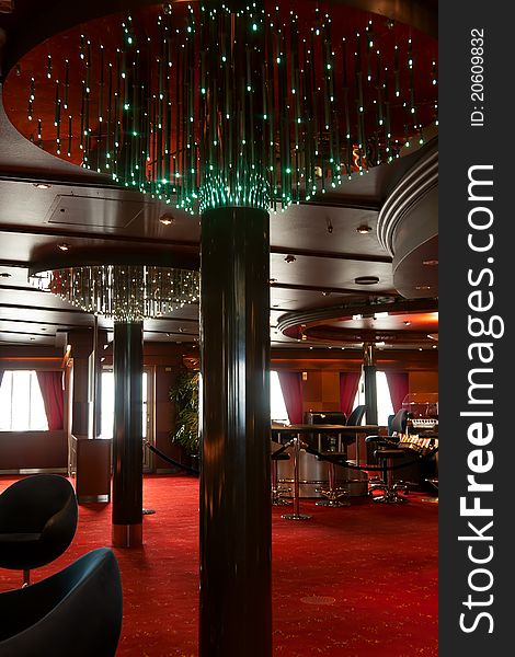 Ship interior restaurant with a red carpet