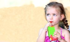 Little Girl Drinking Stock Photography