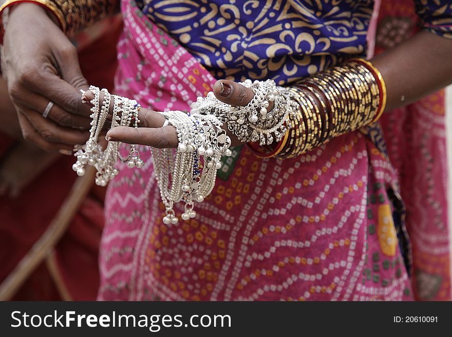 Indian woman showing traditional jewelry. Indian woman showing traditional jewelry