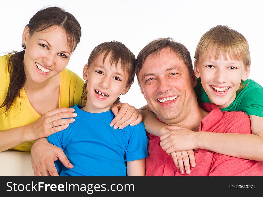 Cute family of a four on white