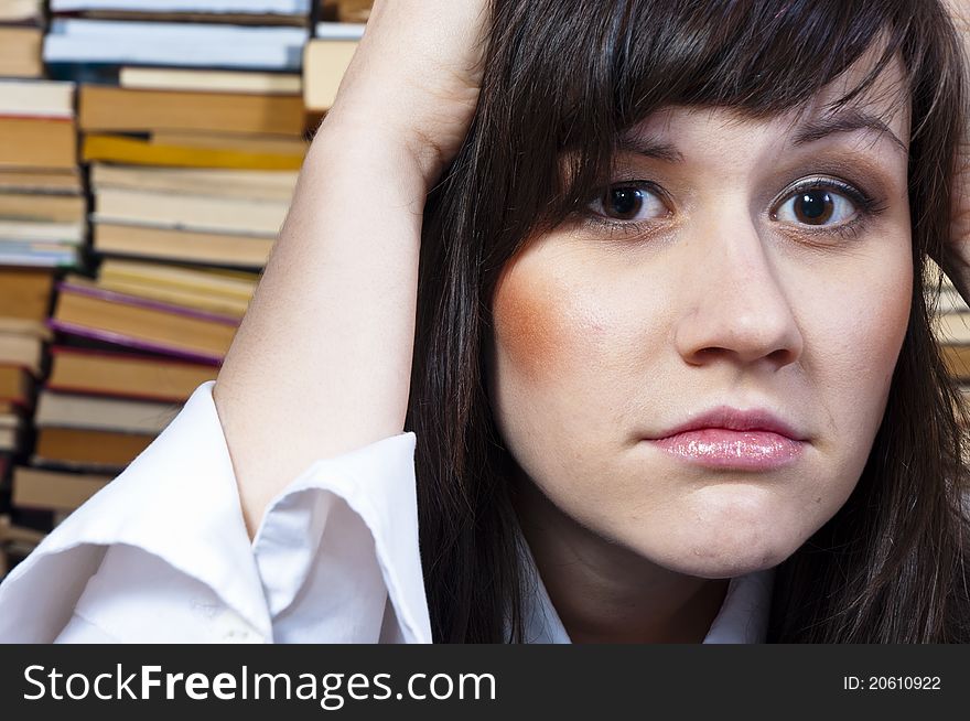 Young student girl with worried expression on her face