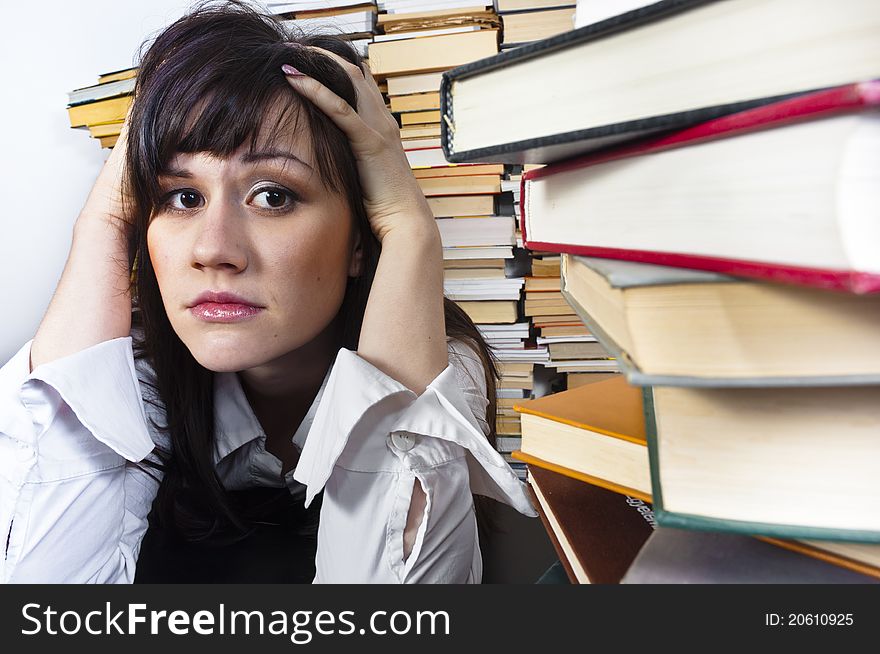 Young student girl with worried expression on her face