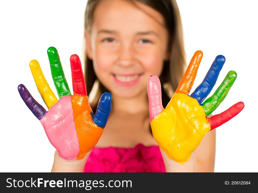 Happy little girl with colored hands. Happy little girl with colored hands
