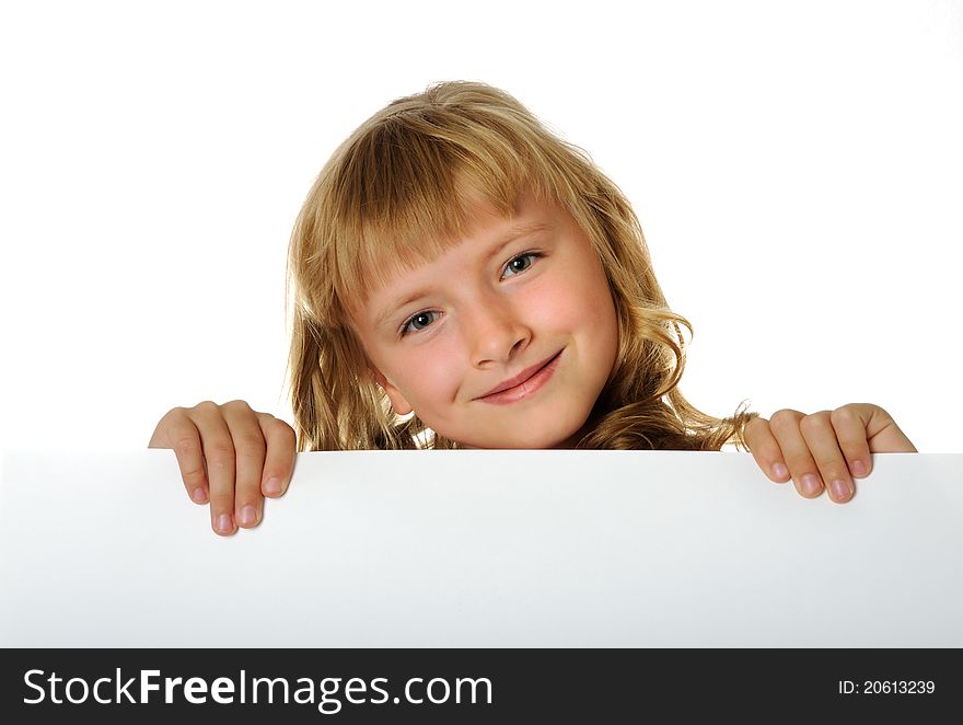 Smiling girl holding white  sheet of a paper, isolated. Smiling girl holding white  sheet of a paper, isolated