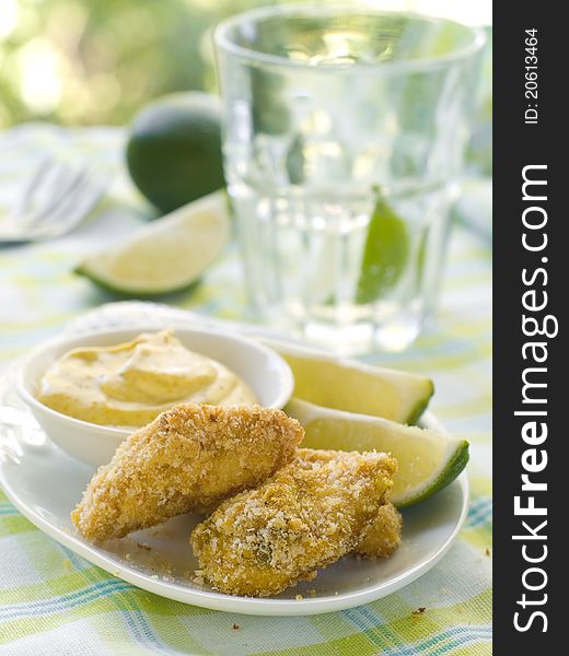 Fresh chicken nuggets with mustard sauce. Selective focus