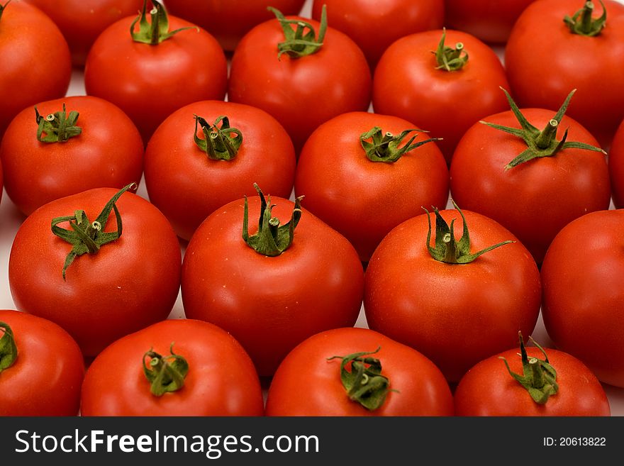 A close up shots of a bunch of tomatoes