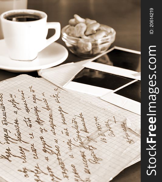 Old letters and pictures with morning coffee,sepia added photo. Old letters and pictures with morning coffee,sepia added photo