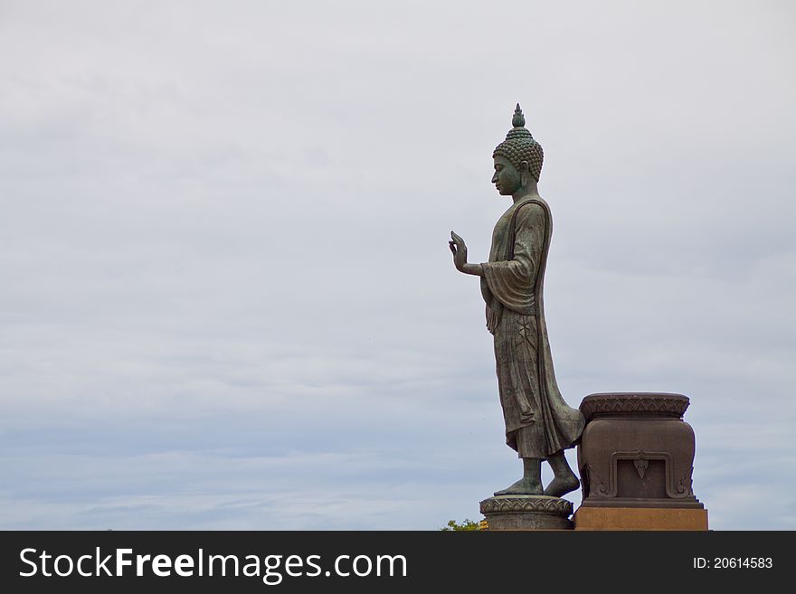 Famous Thai Buddha stand in Buddha garden.