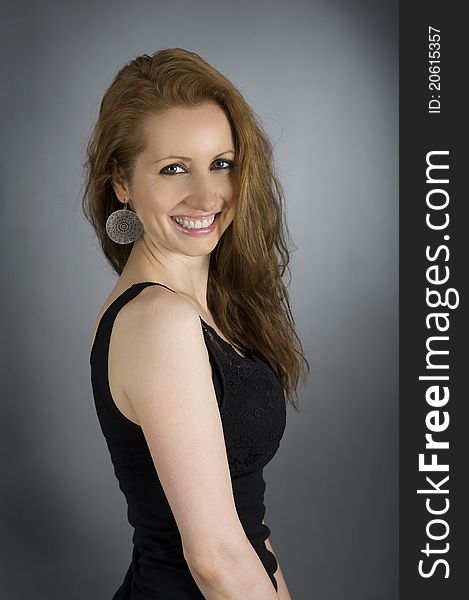 Young lady portrait in the photo studio