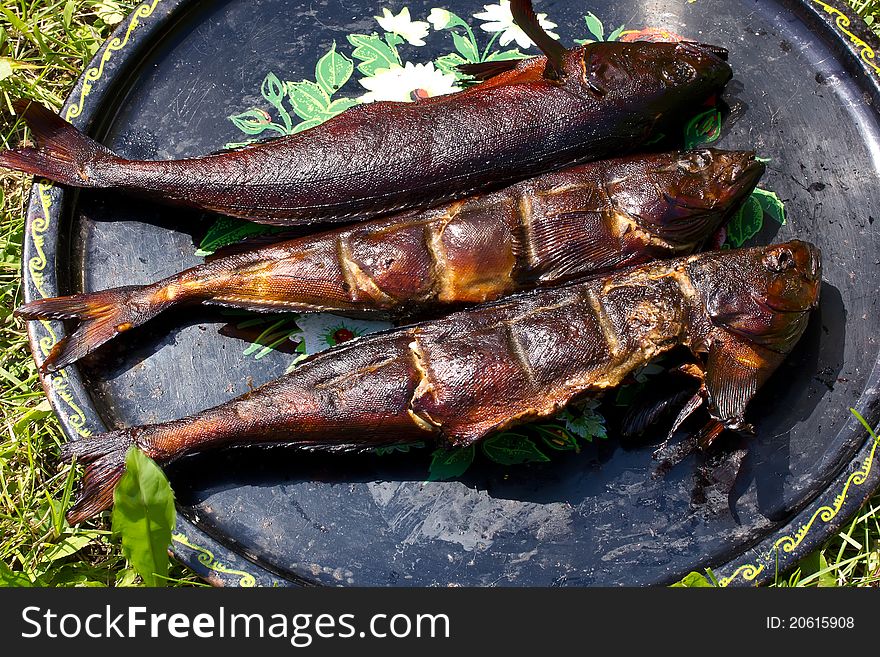 Smoked fish cooked in the smokehouse