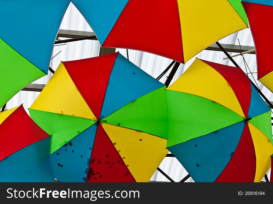 Umbrella with beautiful colors and the background