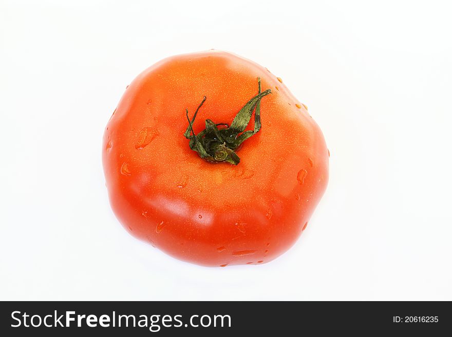 Red tomato over white background