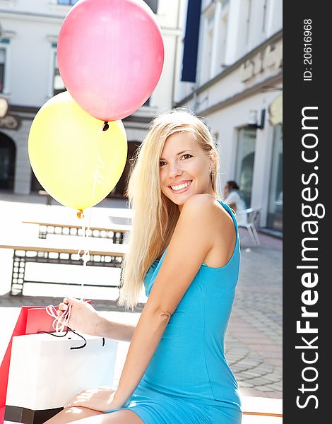 Young Beautiful Girl Relaxing After Shopping