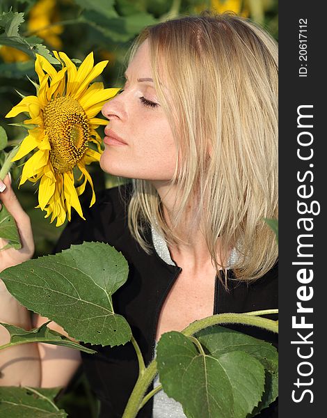 Beauty Woman And Sunflowers