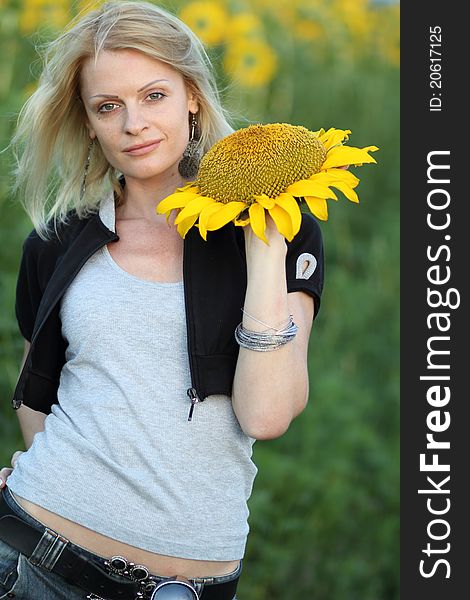 Beauty Woman And Sunflowers