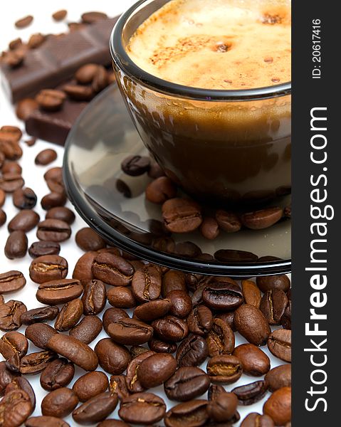 Cappuccino, brown sugar and coffee beans white background