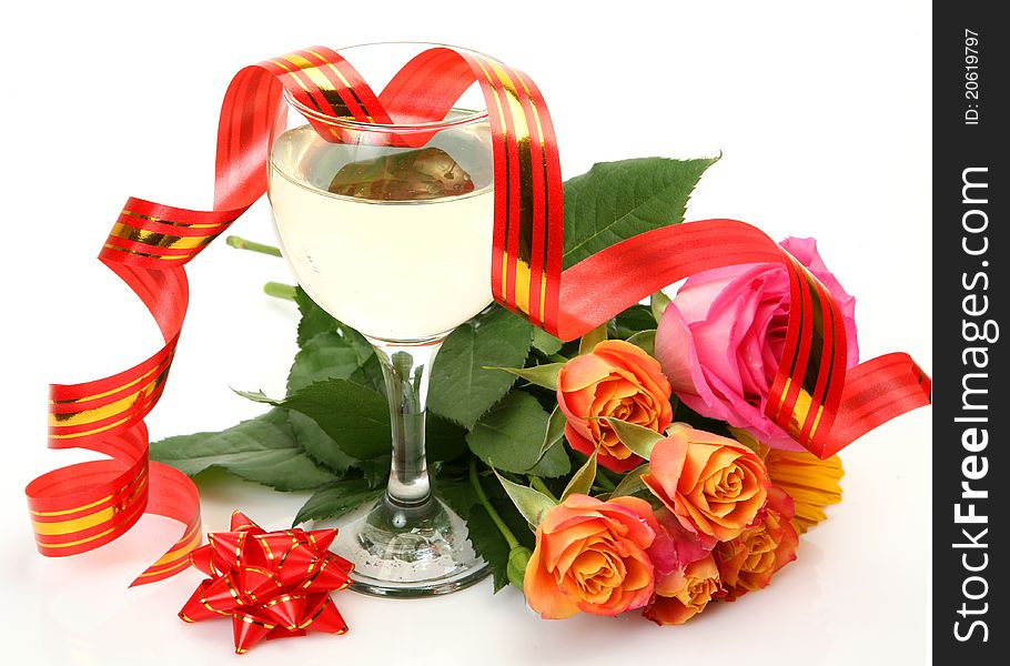 Fine flowers and wine on a white background