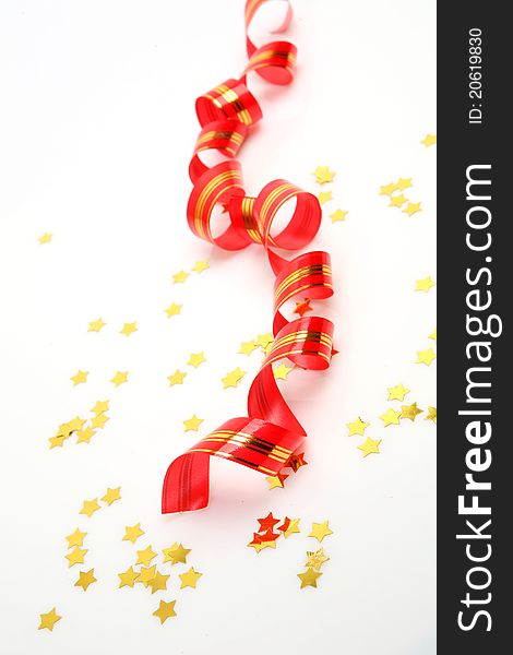 Streamer and confetti on a white background