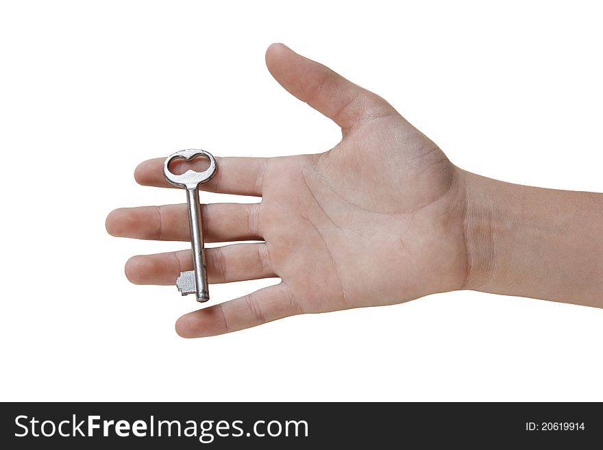 Boy's hand holding a key. Isolated on white background