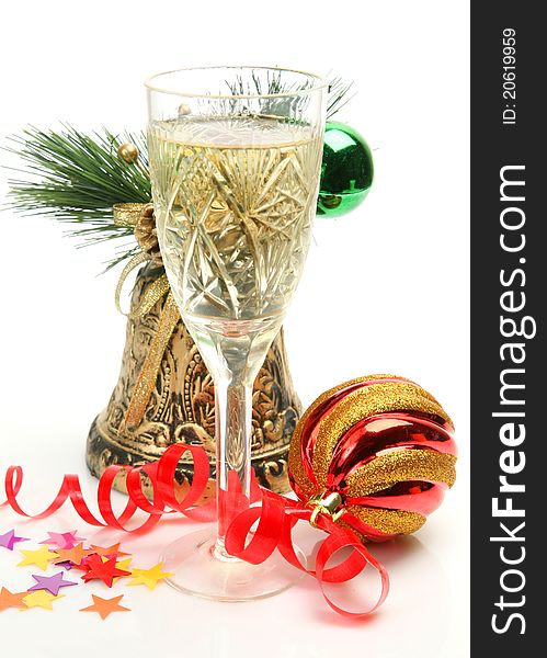 Wine and christmas ornaments on a white background
