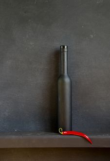 Black Still-life With Red Pepper Stock Images