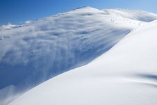 The Snowslope In Mountains Royalty Free Stock Photos