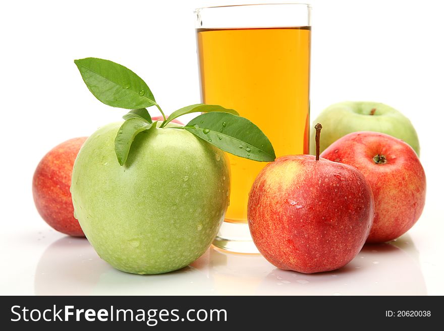 Ripe fruit and juice on a white background