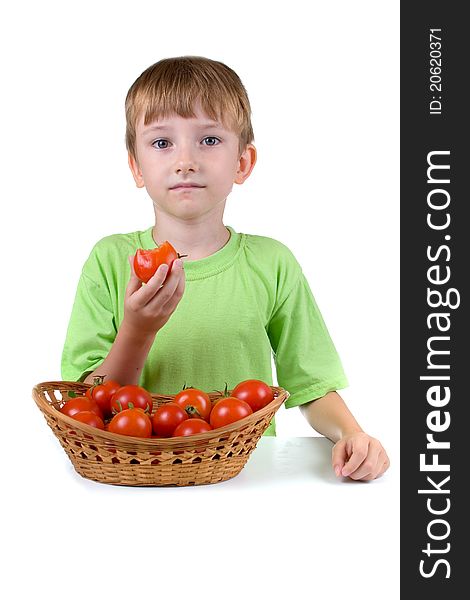 Boy with tomatoes isolated on a white background