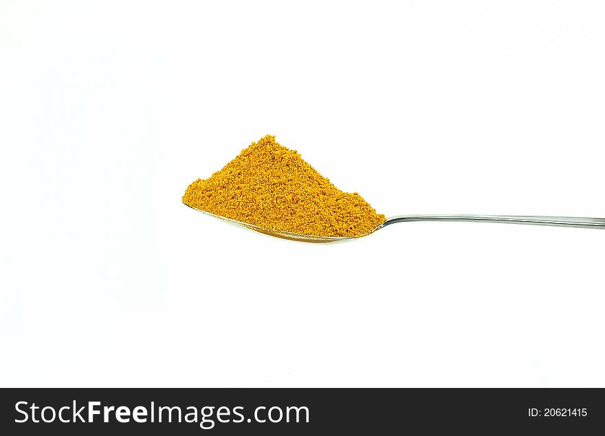 Curry spices on white background