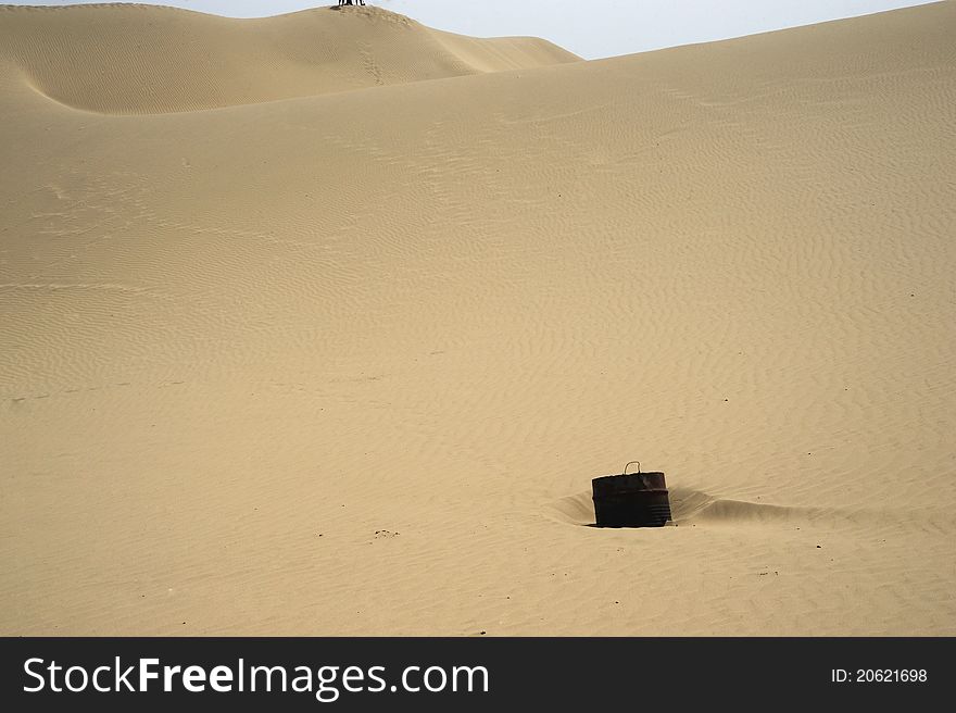 Bucket in sand mountains