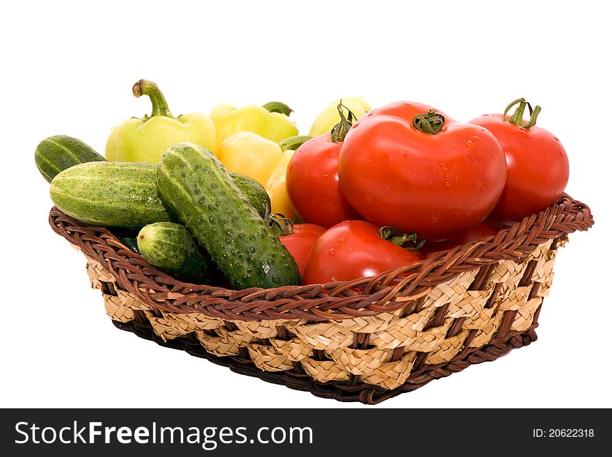 Tomatoes, cucumbers and sweet pepper isolated on white background. Tomatoes, cucumbers and sweet pepper isolated on white background