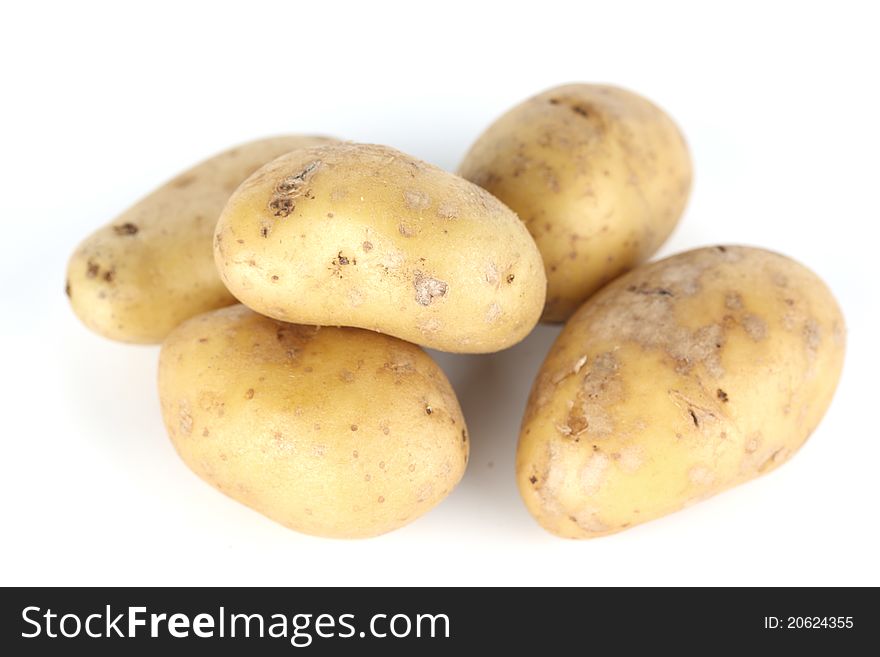 Potato pile isolated on white background