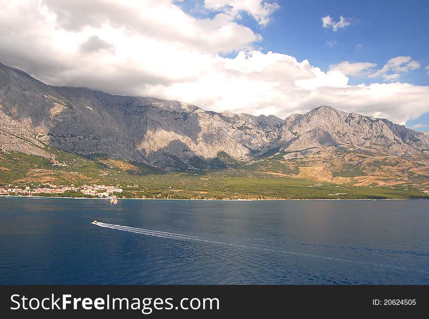 Parasailing on dalmatian coast in Baska Voda in Croatia