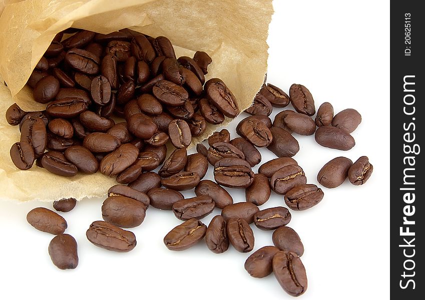 Paper paper bag with coffee grains on a white background