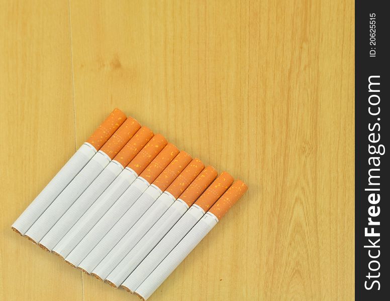 Some cigarettes laid out on a table