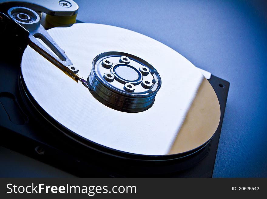 Photo disassembled computer disk HDD. Photo disassembled computer disk HDD