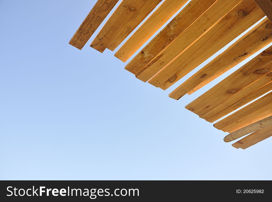 Patterns of wood with a blue sky background. Patterns of wood with a blue sky background
