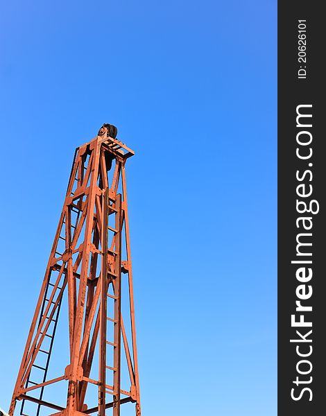 Pulley against nice blue sky. Pulley against nice blue sky