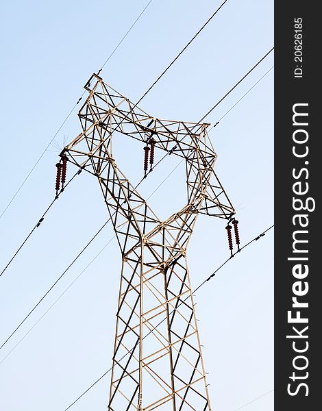 Electric tower in the blue sky, steel power transmission facilities, HeBei, North China.