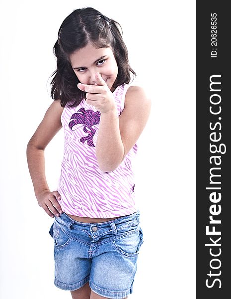 Young Brazilian girl pointing forward. Young Brazilian girl pointing forward