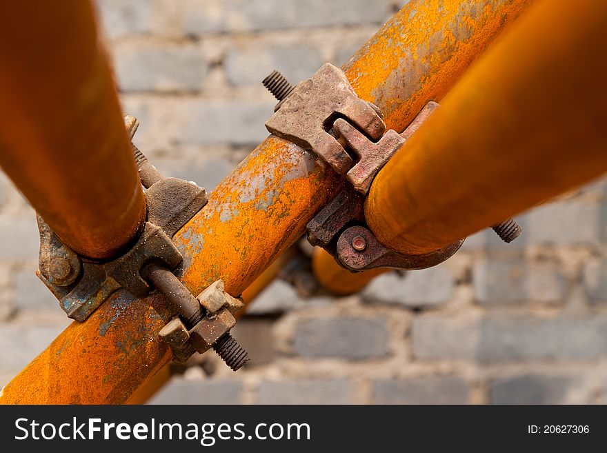 Closeup of rusty scaffold in a construction site