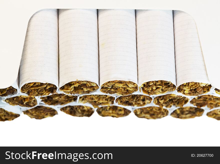 Cigarettes in a pack closeup. Cigarettes in a pack closeup