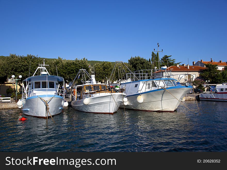Three fishing boats in a croatian harbour