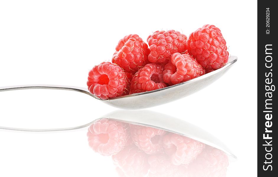 Fresh red ripe raspberry on spoon. Dessert. Fresh red ripe raspberry on spoon. Dessert