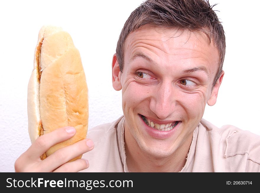 Young man looking at sandwich