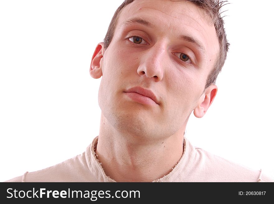 Portrait of a casual young man looking into the camera, isolated on white
