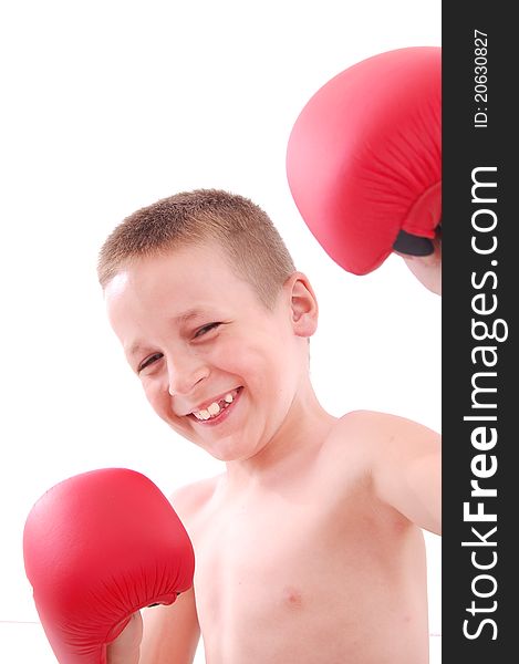 Little boy boxer smiling, isolated on white