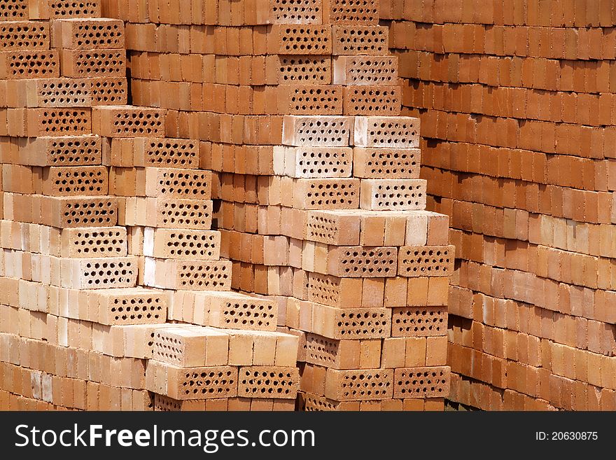 Piled up of red brick