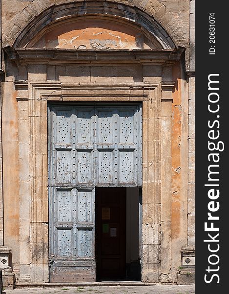 Old door in Tuscan city of San Gimignano