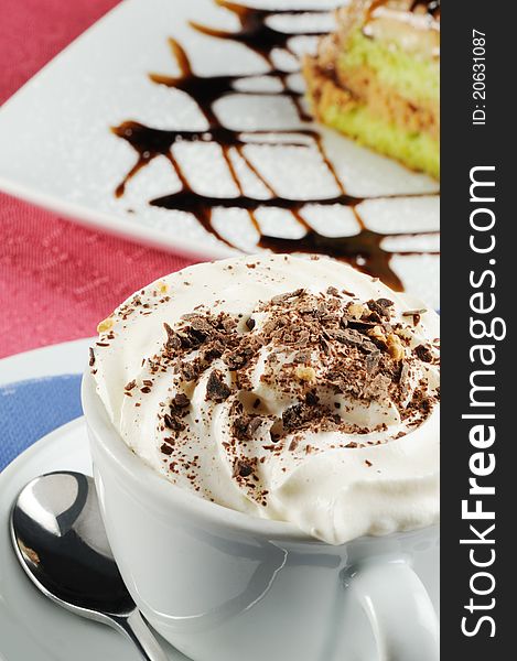 Cappuccino with cream and chocolate flakes